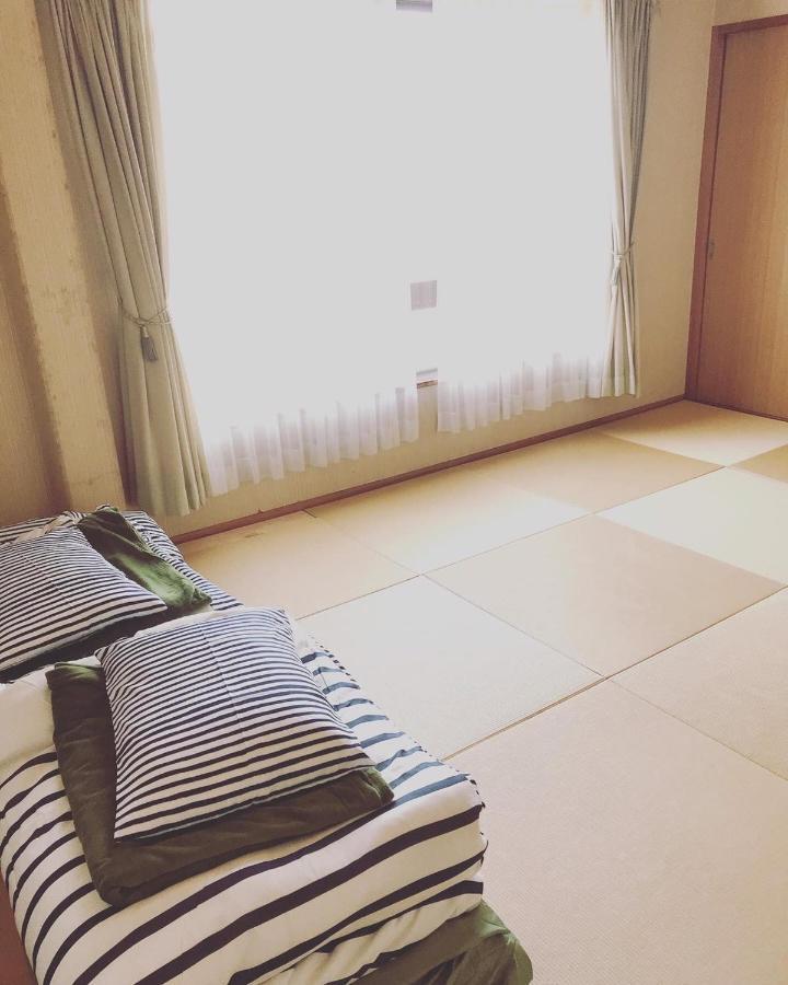 Guest House Yadokari Минамичита Екстериор снимка